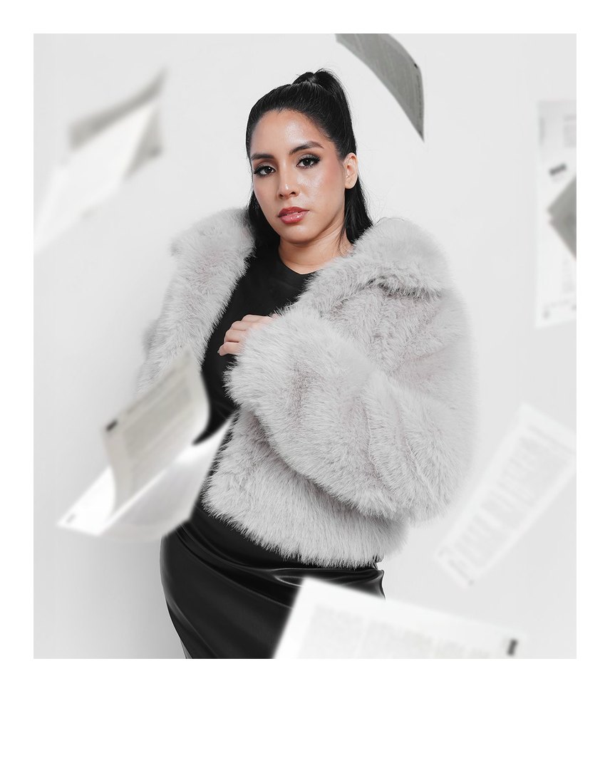 Editorial portrait of Marcela in a grey fur jacket